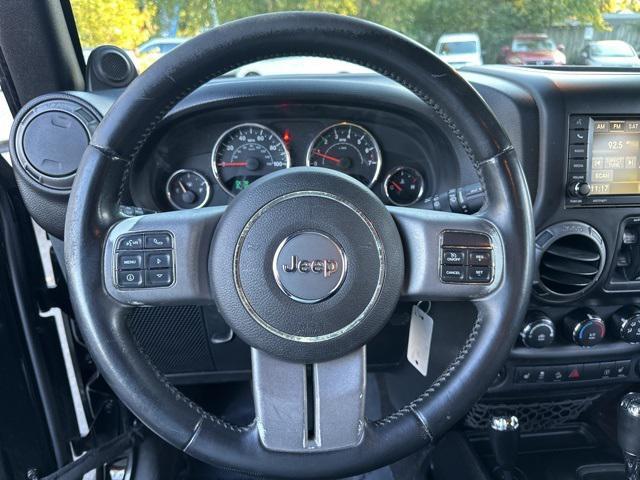 used 2013 Jeep Wrangler Unlimited car, priced at $15,979