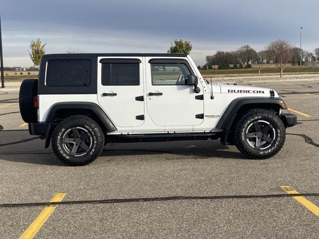 used 2013 Jeep Wrangler Unlimited car, priced at $16,500