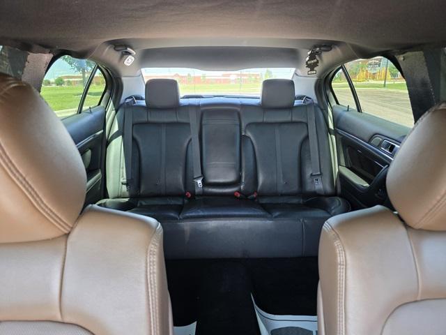 used 2014 Lincoln MKS car, priced at $17,450