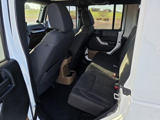 used 2013 Jeep Wrangler Unlimited car, priced at $15,749