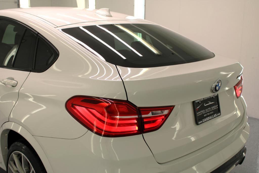 used 2018 BMW X4 car, priced at $31,995