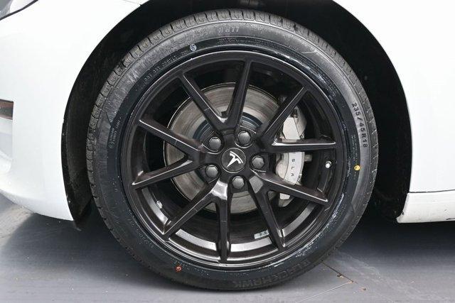 used 2023 Tesla Model 3 car, priced at $17,999