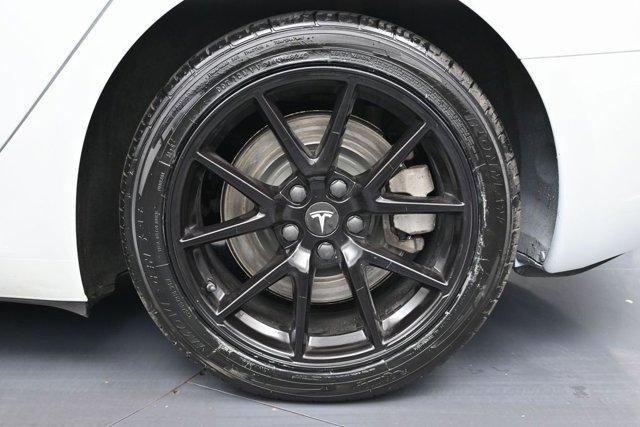 used 2023 Tesla Model 3 car, priced at $17,999