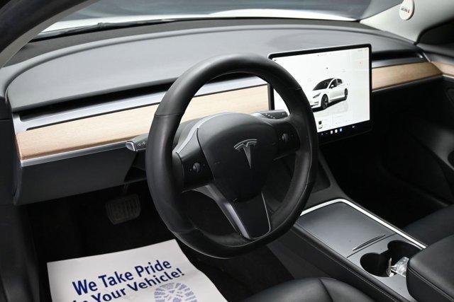 used 2023 Tesla Model 3 car, priced at $17,999
