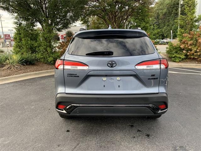 used 2024 Toyota Corolla Cross Hybrid car, priced at $28,992