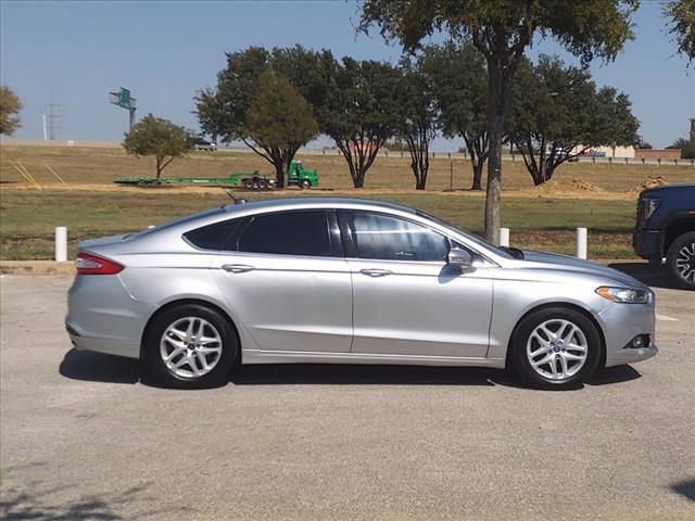 used 2014 Ford Fusion car, priced at $5,977