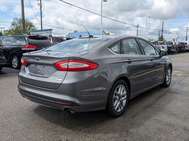 used 2014 Ford Fusion car, priced at $9,065