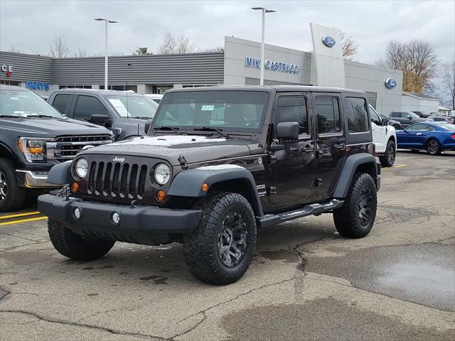 used 2013 Jeep Wrangler Unlimited car, priced at $18,210