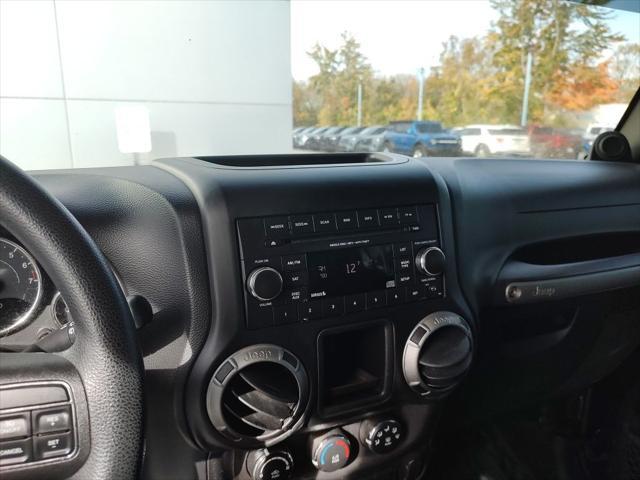 used 2013 Jeep Wrangler Unlimited car, priced at $18,210