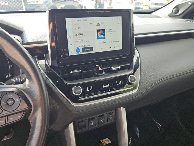 used 2023 Toyota Corolla Cross Hybrid car, priced at $29,603