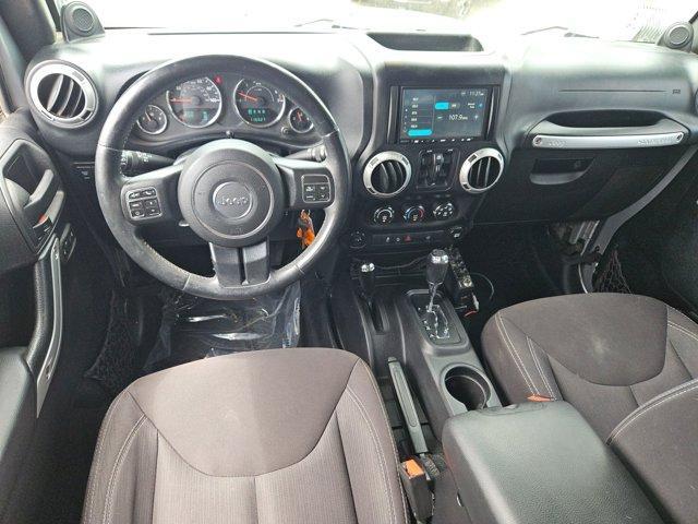 used 2014 Jeep Wrangler Unlimited car, priced at $19,642