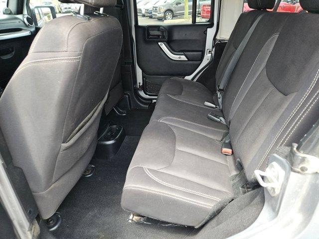 used 2014 Jeep Wrangler Unlimited car, priced at $19,642