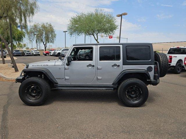 used 2014 Jeep Wrangler Unlimited car, priced at $19,642