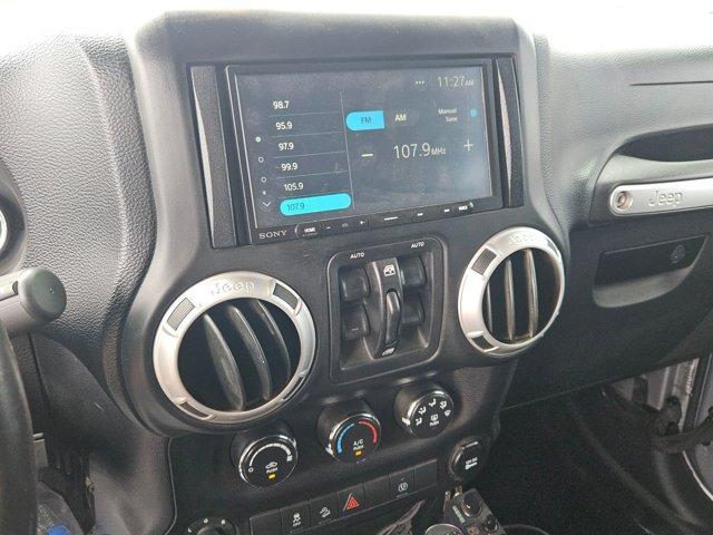 used 2014 Jeep Wrangler Unlimited car, priced at $19,642