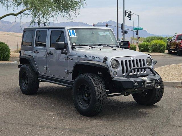 used 2014 Jeep Wrangler Unlimited car, priced at $19,642
