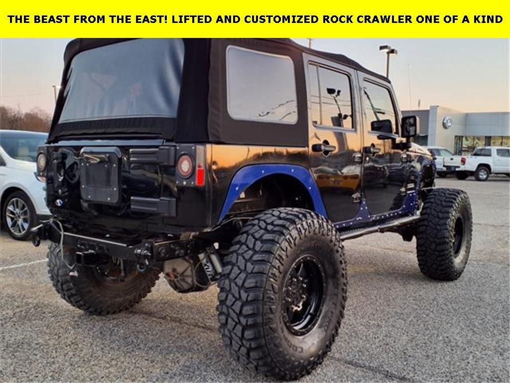 used 2015 Jeep Wrangler Unlimited car, priced at $18,244