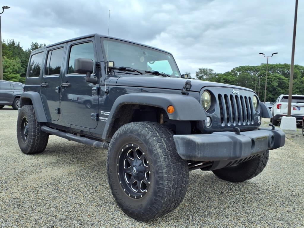 used 2017 Jeep Wrangler Unlimited car, priced at $19,556