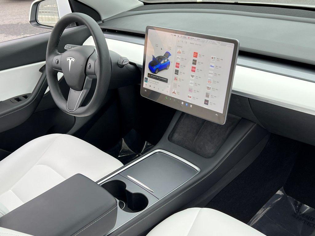 used 2021 Tesla Model Y car, priced at $28,500