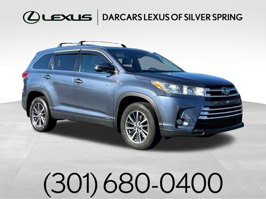 used 2019 Toyota Highlander Hybrid car, priced at $27,800