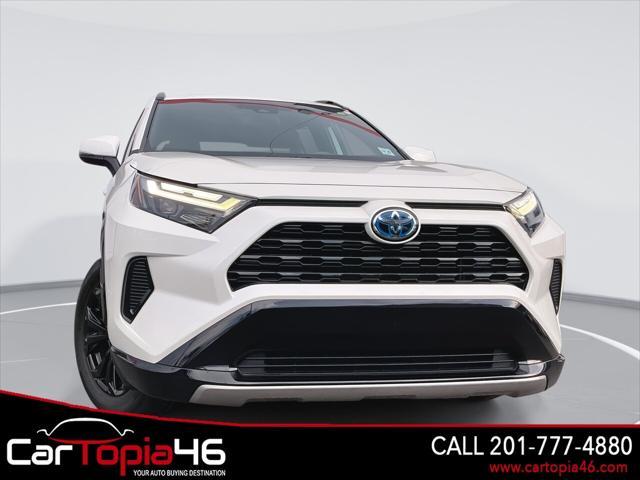 used 2022 Toyota RAV4 Hybrid car, priced at $29,195