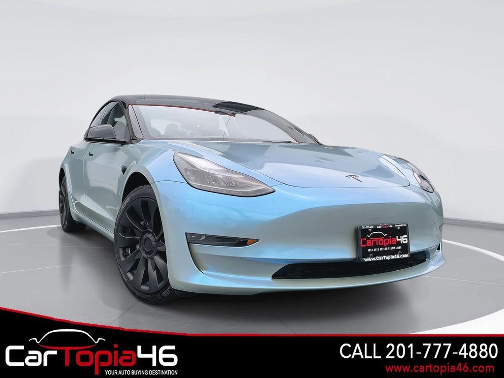 used 2023 Tesla Model 3 car, priced at $25,706