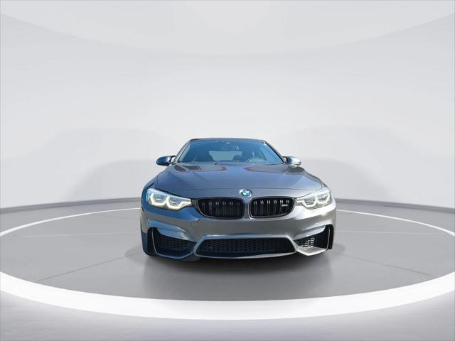 used 2018 BMW M4 car, priced at $43,226