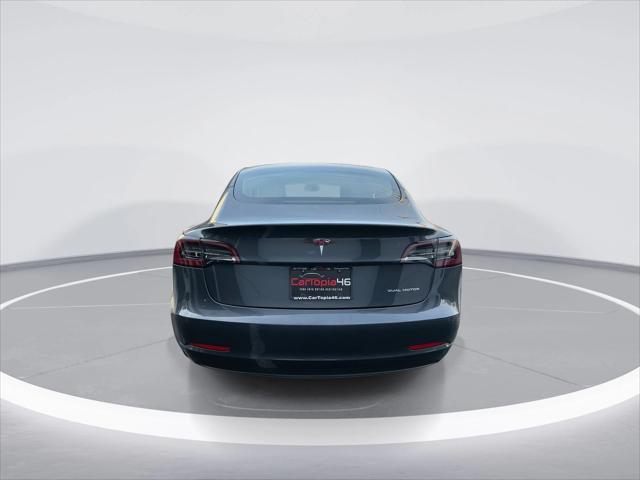 used 2022 Tesla Model 3 car, priced at $26,495