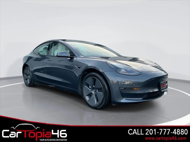 used 2022 Tesla Model 3 car, priced at $26,495