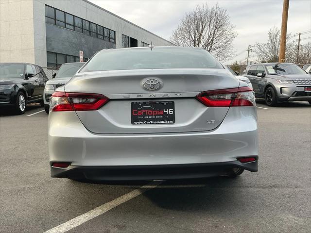 used 2021 Toyota Camry car, priced at $21,182