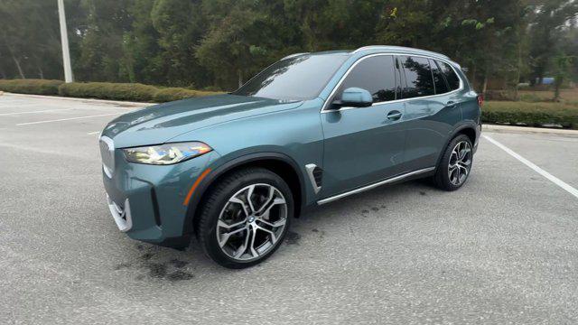 used 2024 BMW X5 car, priced at $65,388