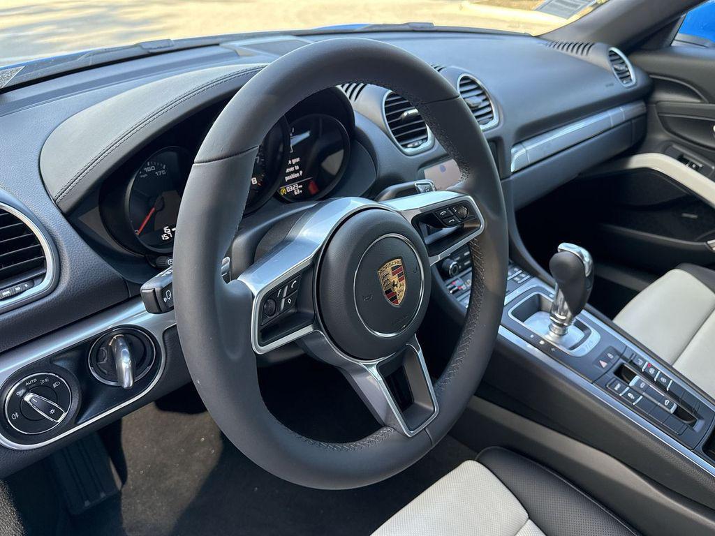 new 2025 Porsche 718 Boxster car, priced at $94,375