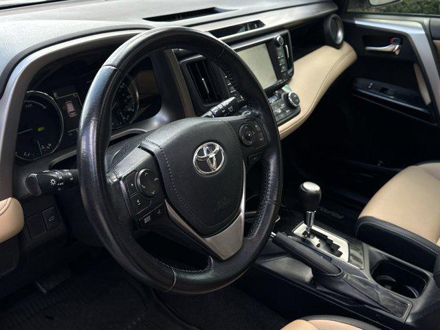 used 2016 Toyota RAV4 Hybrid car, priced at $19,000