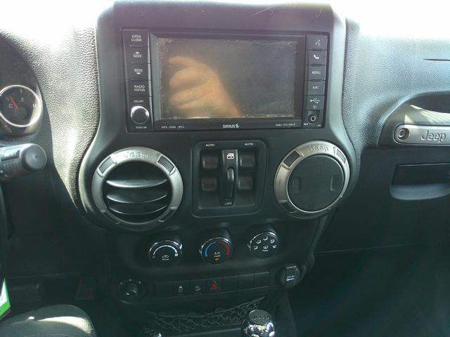 used 2012 Jeep Wrangler Unlimited car, priced at $11,999