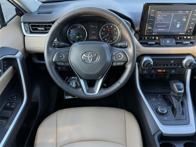 used 2021 Toyota RAV4 Hybrid car, priced at $27,000