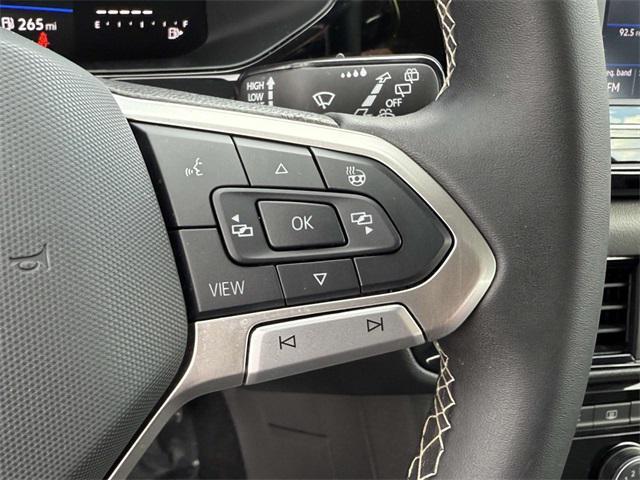 used 2024 Volkswagen Taos car, priced at $21,400
