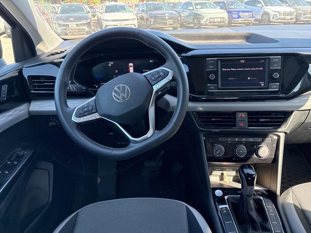 used 2024 Volkswagen Taos car, priced at $21,500