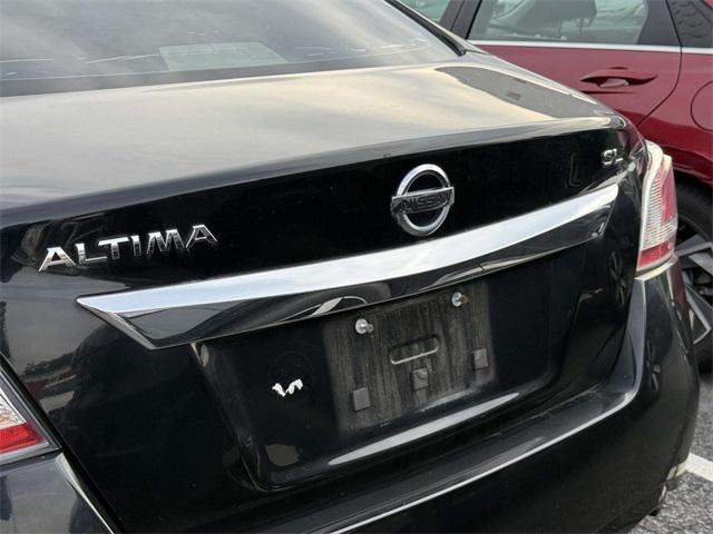 used 2015 Nissan Altima car, priced at $11,000