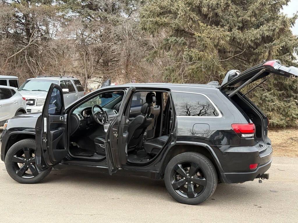 used 2015 Jeep Grand Cherokee car, priced at $9,500