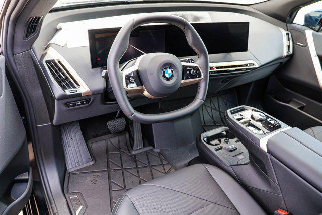 new 2026 BMW iX car, priced at $83,125