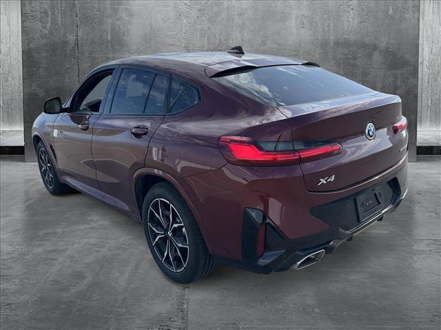 used 2025 BMW X4 car, priced at $54,991