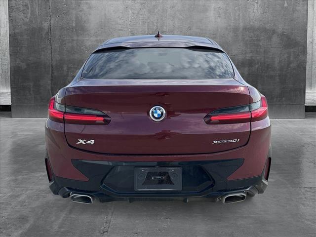 used 2025 BMW X4 car, priced at $54,991