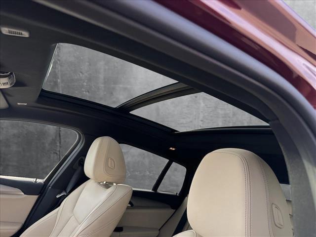 used 2025 BMW X4 car, priced at $54,991