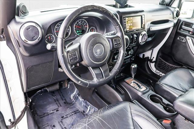 used 2014 Jeep Wrangler Unlimited car, priced at $14,109
