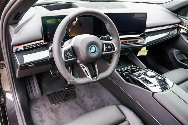 used 2026 BMW 550e car, priced at $81,675