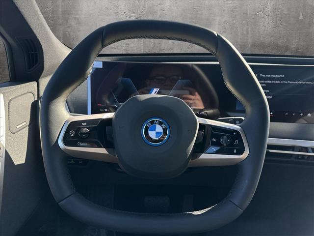 new 2024 BMW iX car, priced at $95,045