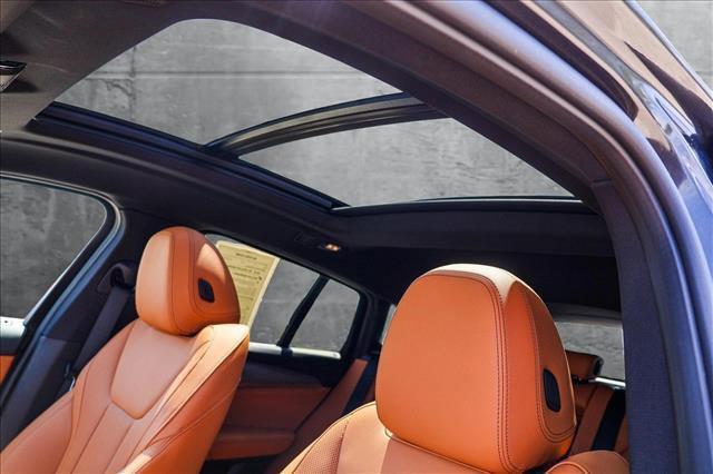 used 2025 BMW X4 car, priced at $53,491