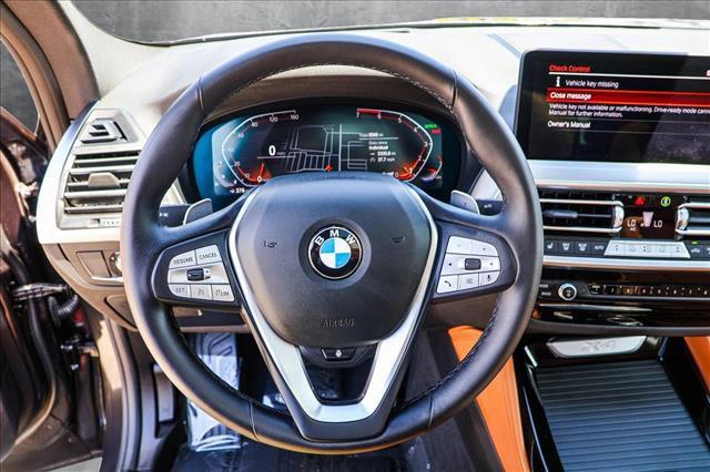used 2025 BMW X4 car, priced at $53,491