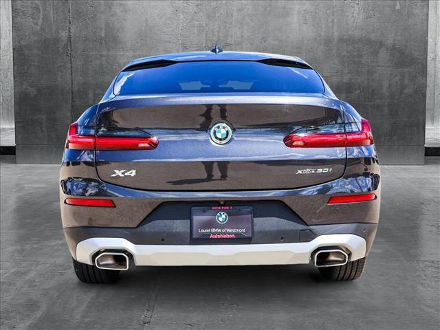 used 2025 BMW X4 car, priced at $53,491