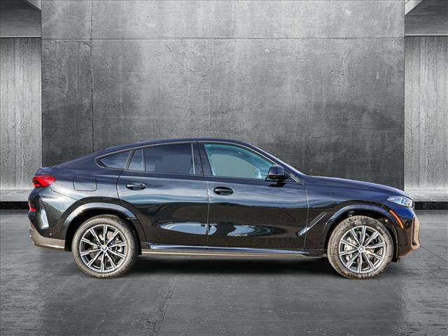 new 2025 BMW X6 car, priced at $77,875