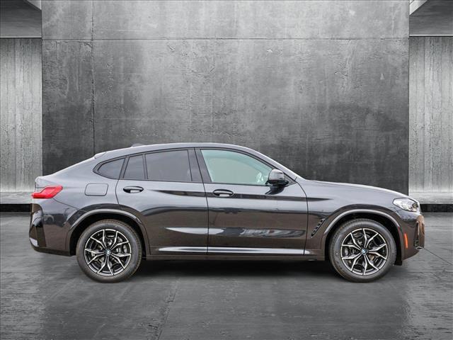 used 2025 BMW X4 car, priced at $60,395